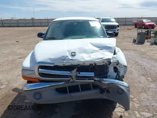 1999 Dodge Dakota SLT with VIN 1B7GL22X6XS186007, listed as a IAAI auction lot 41953254 with 322,541 mi miles. Bid and sale history available at carsss.com. Image 13.