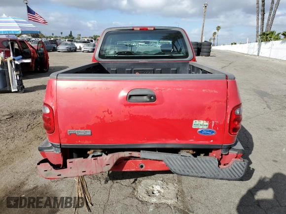 2003 Ford F-150 XL with VIN 1FTRX07213KB93777, listed as a Copart auction lot 46950285 with 176,332 mi miles and Salvage title. Bid and sale history available at DreamBid. Image 6.