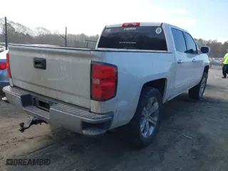 2016 Chevrolet Silverado 1500 LT with VIN 3GCUKREC0GG389084, listed as a IAAI auction lot 41913915 with 183,225 mi miles. Bid and sale history available at carsss.com. Image 4.