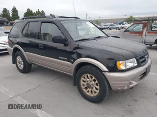 2001 Honda Passport z VIN 4S6DM58WX14404965, wystawiony jako IAAI lot #42045822 z przebiegiem 121 564 mil mil oraz . Historia ofert i sprzedaży dostępna na DreamBid. Obrazek 1.