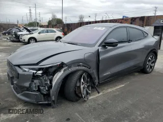 2021 Ford Mustang Mach-E Premium z VIN 3FMTK3SUXMMA09053, wystawiony jako Copart lot #48851195 z przebiegiem 89 767 mil mil oraz Szkody całkowita. Historia ofert i sprzedaży dostępna na DreamBid. Obrazek 1.
