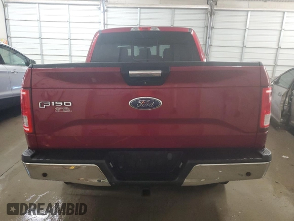 2015 Ford F-150 XLT with VIN 1FTEW1EP7FFC49319, listed as a Copart auction lot 56142895 with 125,052 mi miles and Salvage title. Bid and sale history available at DreamBid. Image 6.