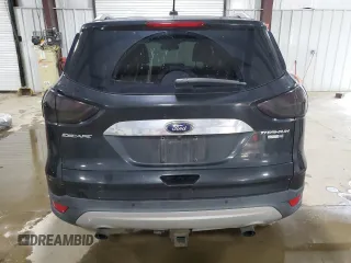 2015 Ford Escape Titanium with VIN 1FMCU9J91FUB77592, listed as a Copart auction lot 62727355 with 94,131 mi miles and Salvage title. Bid and sale history available at DreamBid. Image 6.