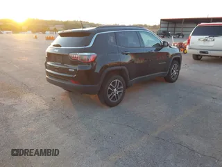 2017 Jeep Compass Latitude with VIN 3C4NJDBB8HT664781, listed as a IAAI auction lot 40670412 with 125,593 mi miles. Bid and sale history available at carsss.com. Image 4.