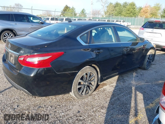 2018 Nissan Altima SV with VIN 1N4AL3AP0JC209978, listed as a IAAI auction lot 41958173 with 104,425 mi miles and . Bid and sale history available at DreamBid. Image 4.