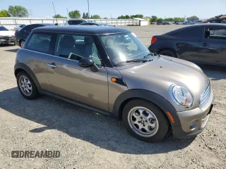 2013 MINI Hardtop with VIN WMWSU3C57DT678736, listed as a Copart auction lot 52586285 with 64,563 mi miles and Salvage Title. Bid and sale history available at DreamBid. Image 4.