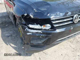 2020 Volkswagen Tiguan S z VIN 3VV1B7AX7LM058984, wystawiony jako IAAI lot #42045211 z przebiegiem 77 293 mil mil oraz . Historia ofert i sprzedaży dostępna na DreamBid. Obrazek 6.