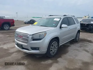 2014 GMC Acadia Denali z VIN 1GKKRTKD1EJ304413, wystawiony jako IAAI lot #41666574 z przebiegiem 115 717 mil mil oraz . Historia ofert i sprzedaży dostępna na DreamBid. Obrazek 2.