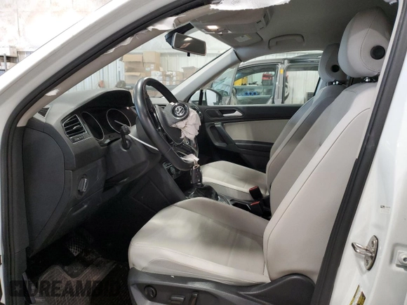 2019 Volkswagen Tiguan SE with VIN 3VV2B7AX0KM157357, listed as a Copart auction lot 55564975 with 57,421 mi miles and Salvage Title. Bid and sale history available at DreamBid. Image 7.