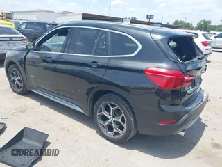 2017 BMW X1 xDrive28i with VIN WBXHT3Z30H4A65417, listed as a IAAI auction lot 42328797 with 103,788 mi miles and . Bid and sale history available at DreamBid. Image 3.