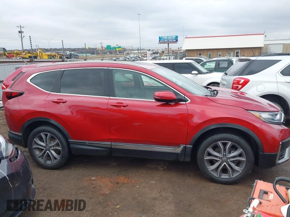 2020 Honda CR-V Touring with VIN 5J6RW2H94LL017434, listed as a IAAI auction lot 41556184 with 97,016 mi miles and . Bid and sale history available at DreamBid. Image 13.