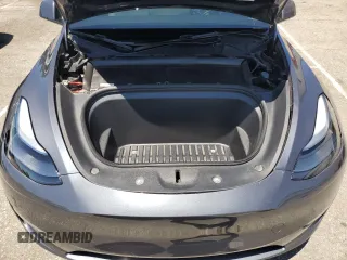 2024 Tesla Model Y Long Range with VIN 7SAYGDEEXRA215975, listed as a Copart auction lot 56705585 with 20,554 mi miles and Salvage Title. Bid and sale history available at DreamBid. Image 11.
