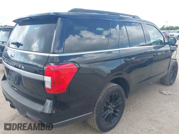 2022 Ford Expedition XLT with VIN 1FMJU1HT1NEA48772, listed as a IAAI auction lot 42442514 with 33,585 mi miles and . Bid and sale history available at DreamBid. Image 4.