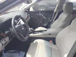 2016 Cadillac CTS RWD with VIN 1G6AP5SX0G0118831, listed as a IAAI auction lot 42105091 with 123,507 mi miles and . Bid and sale history available at DreamBid. Image 5.