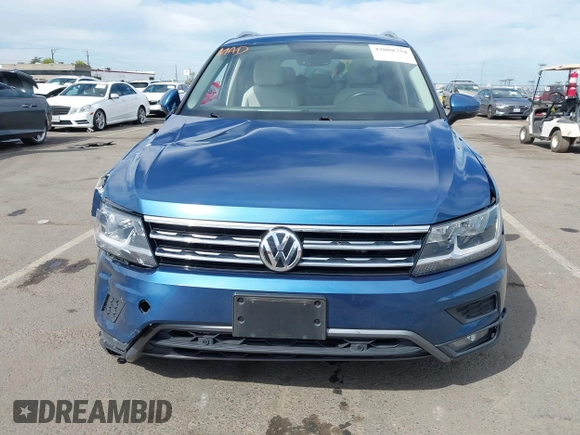 2019 Volkswagen Tiguan SE with VIN 3VV3B7AX2KM064568, listed as a IAAI auction lot 42008754 with 53,132 mi miles and . Bid and sale history available at DreamBid. Image 12.