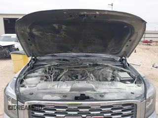 2019 GMC Yukon XL Denali with VIN 1GKS1HKJ0KR257673, listed as a IAAI auction lot 41375951 with 71,291 mi miles. Bid and sale history available at carsss.com. Image 10.