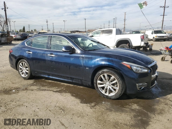 2015 Infiniti Q70 z VIN JN1BY1AP6FM541710, wystawiony jako Copart lot #47126225 z przebiegiem 57 304 mil mil oraz Szkoda całkowita • Salvage title. Historia ofert i sprzedaży dostępna na DreamBid. Obrazek 4.