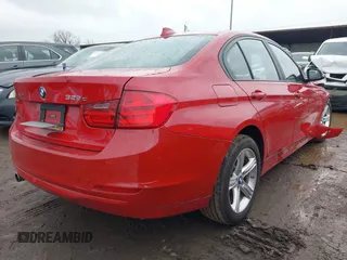 2014 BMW 3 Series 328d xDrive with VIN WBA3D5C51EKX97440, listed as a IAAI auction lot 41576050 with 124,242 mi miles. Bid and sale history available at carsss.com. Image 4.