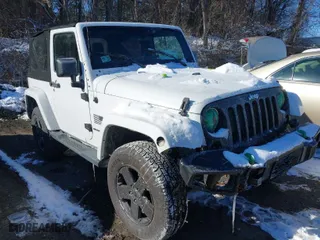 2012 Jeep Wrangler Arctic with VIN 1C4GJWBG9CL290847, listed as a IAAI auction lot 41281316 with 106,473 mi miles. Bid and sale history available at carsss.com. Image 1.