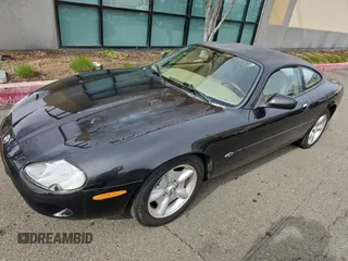 1997 Jaguar XK with VIN SAJGX5747VC007213, listed as a Copart auction lot 45953175 with 82,461 mi miles and Clean Title. Bid and sale history available at DreamBid. Image 2.