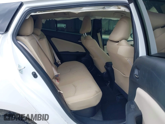 2022 Toyota Prius L Eco with VIN JTDKAMFUXN3157225, listed as a IAAI auction lot 39292379 with 59,333 mi miles and . Bid and sale history available at DreamBid. Image 8.