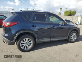 2016 Mazda CX-5 Sport with VIN JM3KE2BY0G0730906, listed as a Copart auction lot 51611865 with 207,166 mi miles and Salvage Title. Bid and sale history available at carsss.com. Image 3.