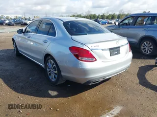 2016 Mercedes-Benz C with VIN 55SWF4JB6GU133923, listed as a IAAI auction lot 41720355 with 63,209 mi miles. Bid and sale history available at carsss.com. Image 3.