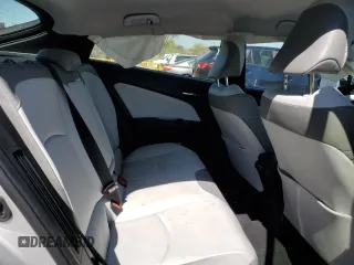 2020 Toyota Prius Prime LE with VIN JTDKARFP3L3129111, listed as a Copart auction lot 52462165 with 56,015 mi miles and Salvage Title. Bid and sale history available at carsss.com. Image 10.