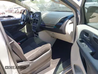 2016 Dodge Grand Caravan SE with VIN 2C4RDGBG9GR385847, listed as a IAAI auction lot 42042755 with 32,613 mi miles and . Bid and sale history available at DreamBid. Image 5.