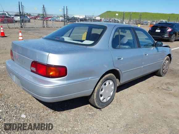1996 Toyota Camry DX with VIN JT2BG12K4T0381387, listed as a IAAI auction lot 41866017 with 177,198 mi miles. Bid and sale history available at carsss.com. Image 4.