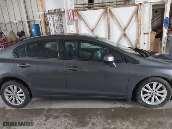 2012 Honda Civic Sdn EX with VIN 2HGFB2F80CH329781, listed as a IAAI auction lot 41624733 with 246,819 mi miles. Bid and sale history available at carsss.com. Image 13.