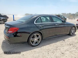 2017 Mercedes-Benz E 300 Luxury with VIN WDDZF4JB8HA123652, listed as a Copart auction lot 57050205 with 105,048 mi miles and Salvage title. Bid and sale history available at DreamBid. Image 3.