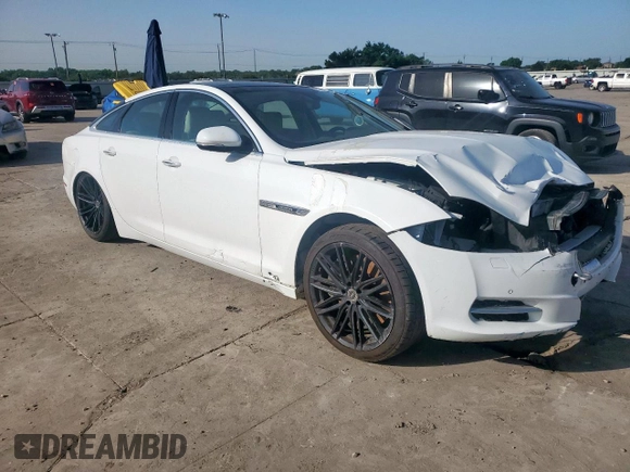2014 Jaguar XJ Supercharged z VIN SAJWA1GT4EMV60053, wystawiony jako Copart lot #57643005 z przebiegiem 48 139 mil mil oraz Szkoda całkowita • Salvage title. Historia ofert i sprzedaży dostępna na DreamBid. Obrazek 4.