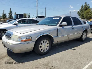 2003 Mercury Grand Marquis LS Premium z VIN 2MEFM75W73X712854, wystawiony jako Copart lot #56333035 z przebiegiem 114 025 mil mil oraz Szkoda całkowita • Salvage title. Historia ofert i sprzedaży dostępna na DreamBid. Obrazek 1.