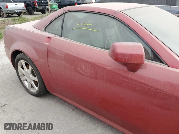 2005 Cadillac XLR z VIN 1G6YV34A855601016, wystawiony jako Copart lot #74436784 z przebiegiem Nie podano mil oraz Szkody całkowita. Historia ofert i sprzedaży dostępna na DreamBid. Obrazek 12.