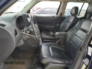 2014 Jeep Patriot High Altitude with VIN 1C4NJPFA3ED676843, listed as a Copart auction lot 49769215 with 122,606 mi miles and Salvage Title. Bid and sale history available at carsss.com. Image 7.