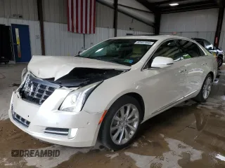 2014 Cadillac XTS Premium z VIN 2G61P5S39E9119542, wystawiony jako Copart lot #60987865 z przebiegiem 113 196 mil mil oraz Czysty tytuł • Clean title. Historia ofert i sprzedaży dostępna na DreamBid. Obrazek 1.