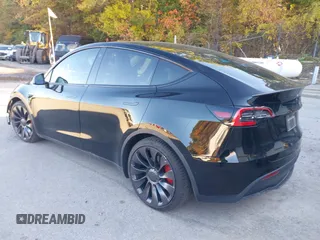 2020 Tesla Model Y Long Range with VIN 5YJYGDEF2LF037298, listed as a IAAI auction lot 37832056 with 40,417 mi miles and . Bid and sale history available at DreamBid. Image 3.