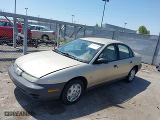 1996 Saturn SL with VIN 1G8ZH5288TZ230864, listed as a IAAI auction lot 42116703 with 104,387 mi miles. Bid and sale history available at carsss.com. Image 2.