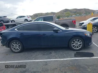2017 Mazda 6 Sport with VIN JM1GL1U51H1156104, listed as a IAAI auction lot 41769388 with 121,405 mi miles and . Bid and sale history available at DreamBid. Image 14.