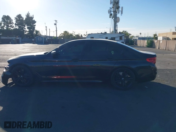 2019 BMW 5 Series M550i xDrive with VIN WBAJB9C51KB288416, listed as a IAAI auction lot 41265378 with 52,529 mi miles and . Bid and sale history available at DreamBid. Image 15.