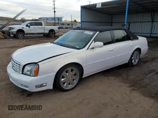 2004 Cadillac DeVille DTS z VIN 1G6KF57944U122824, wystawiony jako Copart lot #86147994 z przebiegiem 118 156 mil mil oraz Szkody całkowita. Historia ofert i sprzedaży dostępna na DreamBid. Obrazek 1.