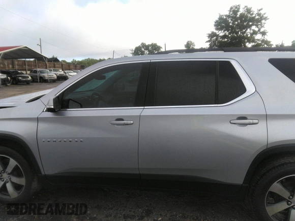 2021 Chevrolet Traverse LT with VIN 1GNERHKW6MJ157311, listed as a IAAI auction lot 42256458 with 97,635 mi miles and . Bid and sale history available at DreamBid. Image 14.