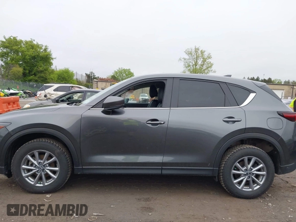 2023 Mazda CX-5 S Select with VIN JM3KFBBM4P0228412, listed as a IAAI auction lot 42194856 with 31,708 mi miles and . Bid and sale history available at carsss.com. Image 14.