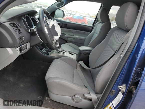 2014 Toyota Tacoma with VIN 5TFLU4EN7EX106909, listed as a Copart auction lot 46906235 with 102,681 mi miles and Salvage Title. Bid and sale history available at DreamBid. Image 7.
