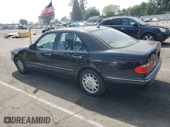 2002 Mercedes-Benz E-Class with VIN WDBJF82JX2X064384, listed as a Copart auction lot 53058325 with 188,440 mi miles and Salvage Title. Bid and sale history available at carsss.com. Image 2.