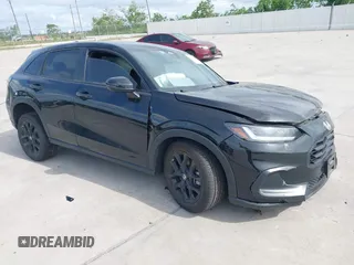 2024 Honda HR-V Sport z VIN 3CZRZ1H53RM707679, wystawiony jako IAAI lot #42041371 z przebiegiem 32 383 mil mil oraz . Historia ofert i sprzedaży dostępna na DreamBid. Obrazek 1.