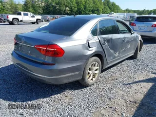 2016 Volkswagen Passat S with VIN 1VWAT7A31GC043362, listed as a IAAI auction lot 42401167 with 166,796 mi miles and . Bid and sale history available at DreamBid. Image 4.