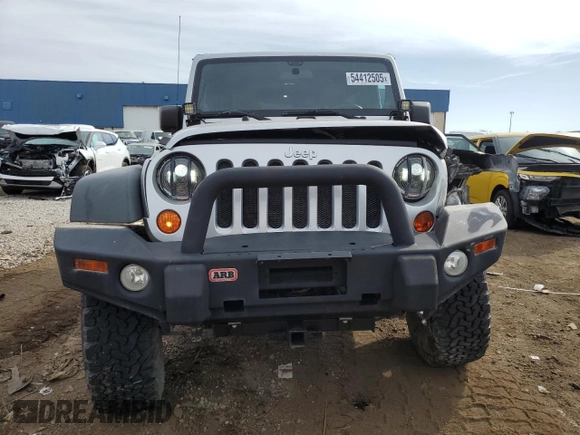 2011 Jeep Wrangler Unlimited Rubicon with VIN 1J4BA6H1XBL571187, listed as a Copart auction lot 54412505 with 83,819 mi miles and Clean title. Bid and sale history available at DreamBid. Image 5.