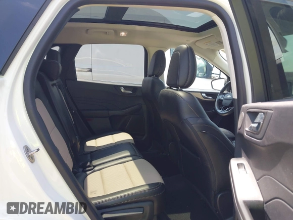2021 Ford Escape Titanium with VIN 1FMCU9J91MUA29407, listed as a IAAI auction lot 42120442 with 19,314 mi miles and . Bid and sale history available at DreamBid. Image 8.